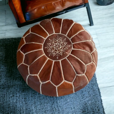 Brown leather pouf