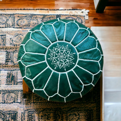 Green leather pouf