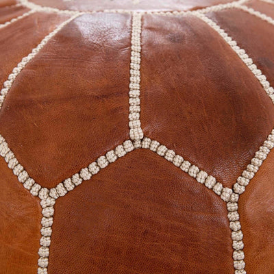 Brown leather pouf