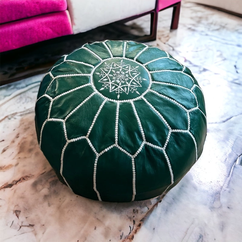 Green leather pouf