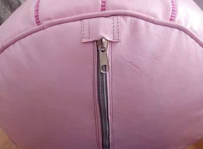 Pink leather pouf