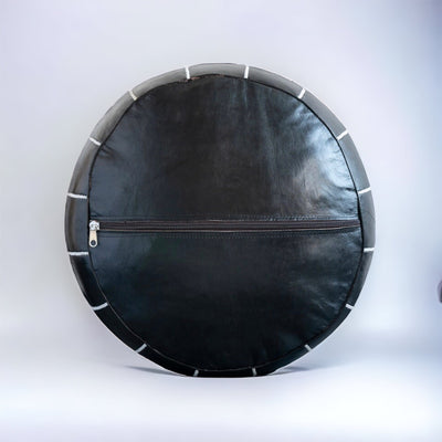 Black leather pouf